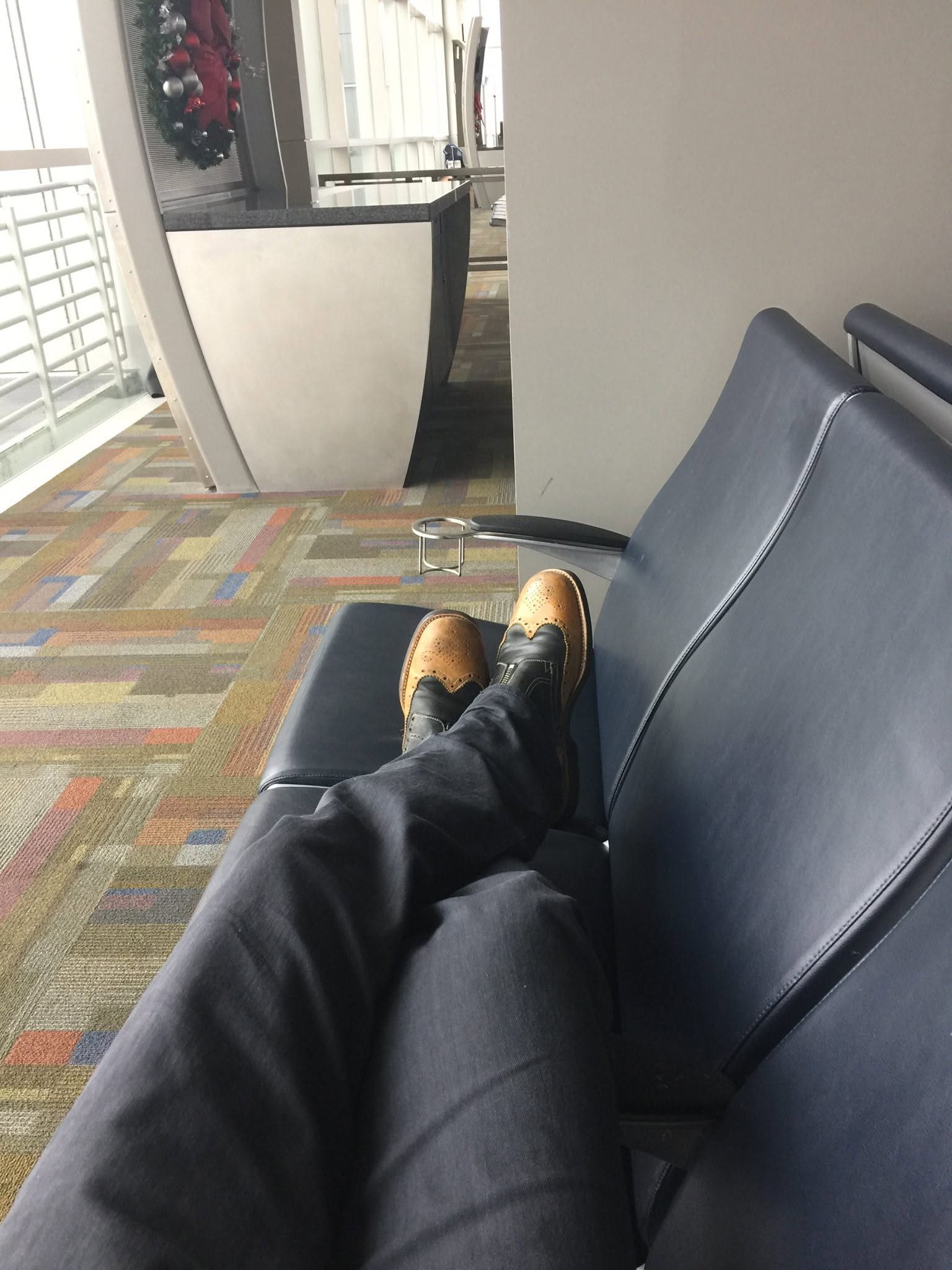 Toschi shoes worn with navy trousers
